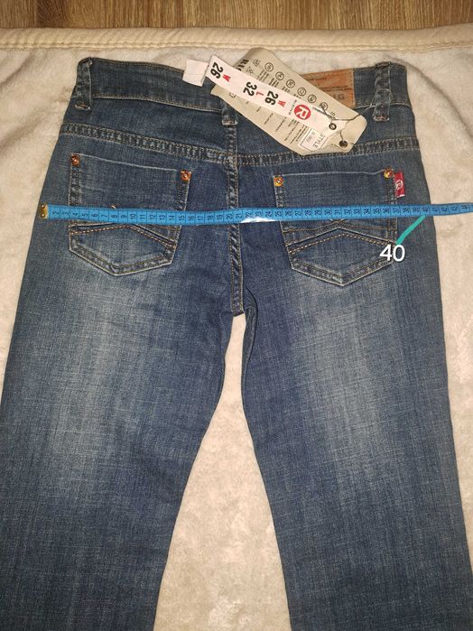 Jeansy z metką niebieskie