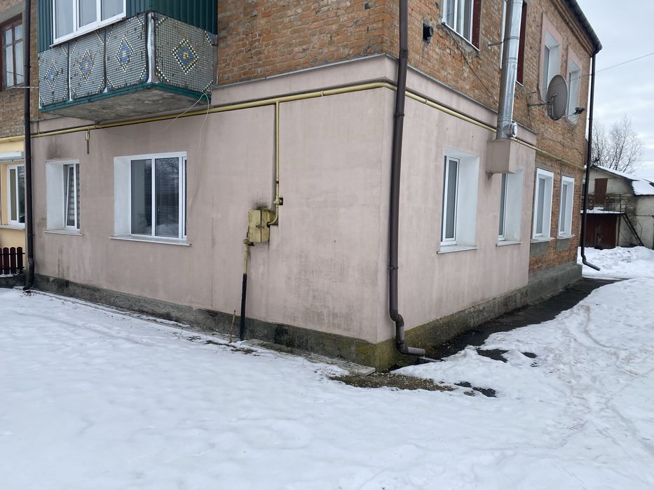 Квартира з земельною ділянкою!