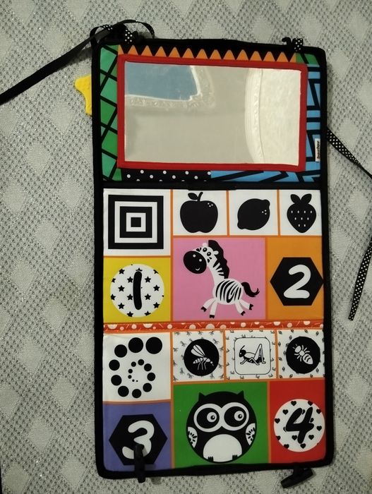 Розвиваюча книжка з дзеркалом, яка складається.