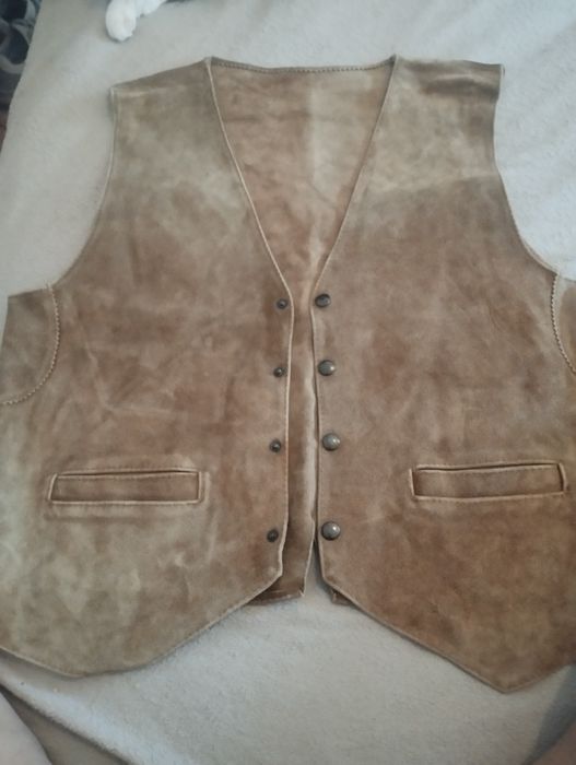 Coleto de pele em ótimo estado