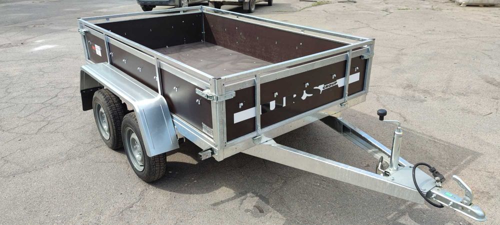 Прицеп двух осник, две оси, усиленный бортовой, оцинкованный Ursa,