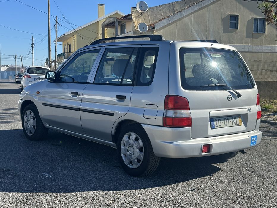 Mazda Demio 1.3 Glx de 1999 a gás