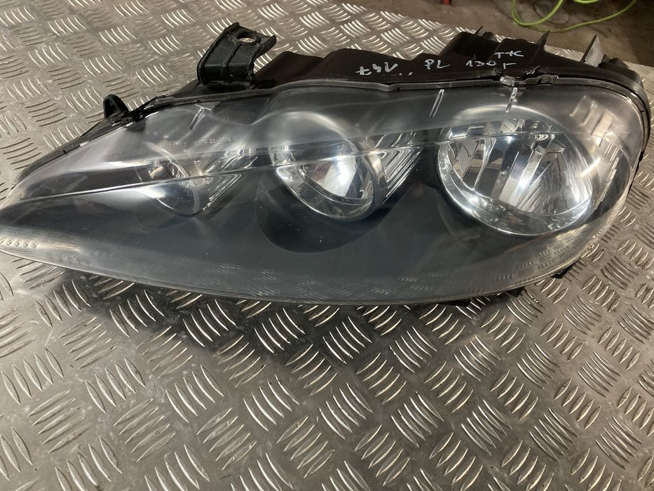 Części Alfa Romeo 147 lampa przednia lewa Tyc