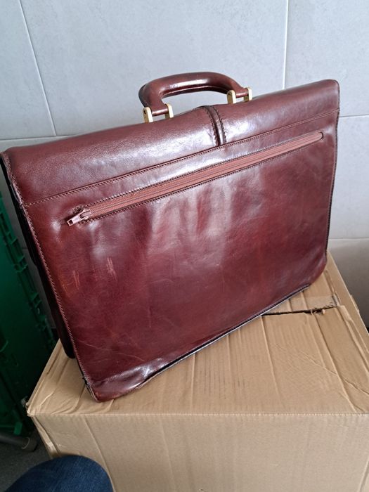 Mala de pele como nova