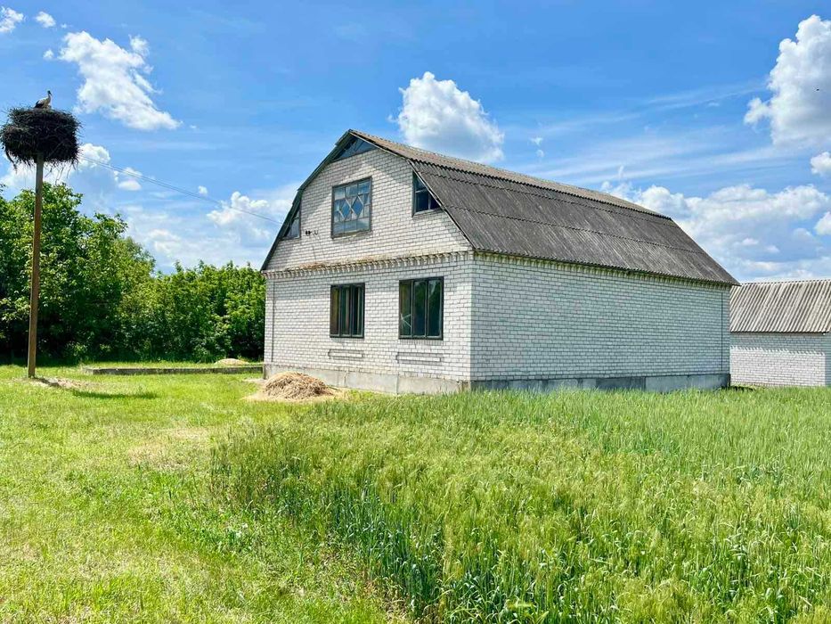 Продам будинок з земеньною ділянкою поруч з р. Псел у с. Нижня Мануйлівка