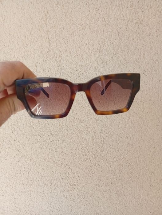 Oculos de sol senhora