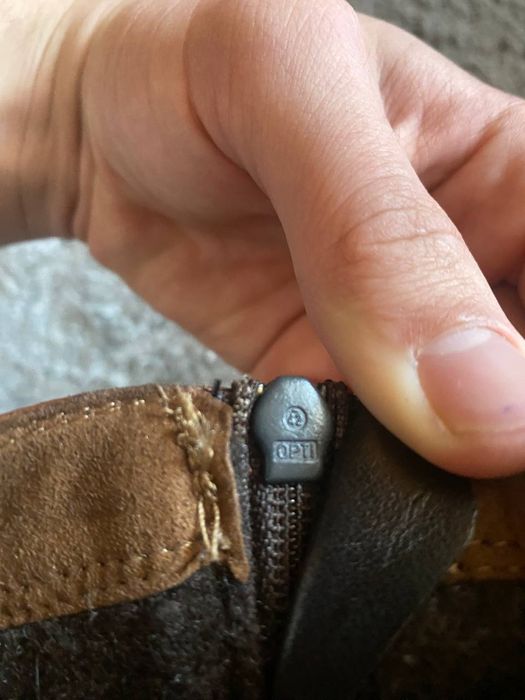 черевики Clarks.