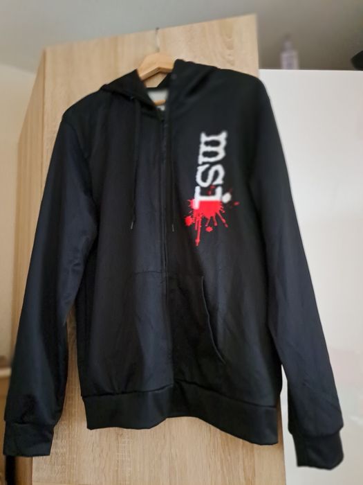 Młodzieżowa czarna wiosenna bluza z połyskiem.