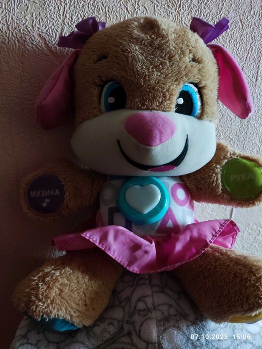 Музыкальные игрушки разговаривают:"Веселый гремлин", "Девочка-собачка"