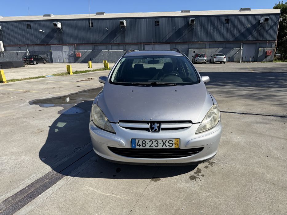Peuogot 307 ano 2004  gasolina e gas