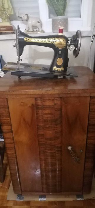 Maquina de costura singer