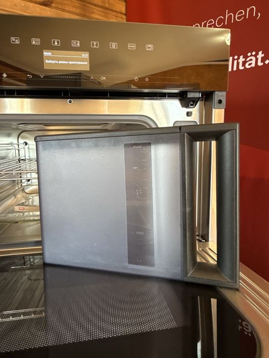 Парова шафа з мікрохвильовою функцією Miele DGM 7440 OBSW | стан ідеал