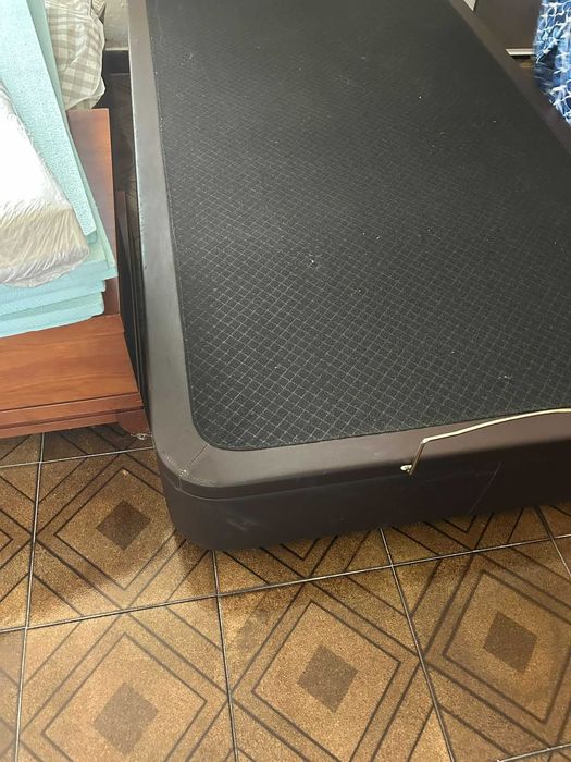 Cama com arrumação