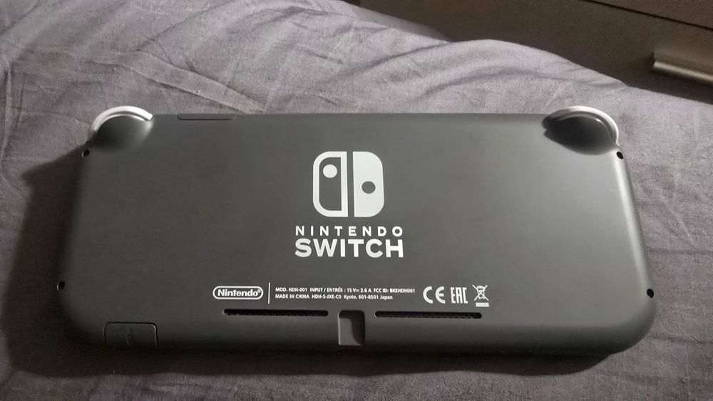 Nintendo Switch Lite (como nova) + capa