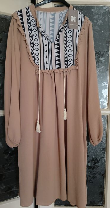 Vestido outonal novo