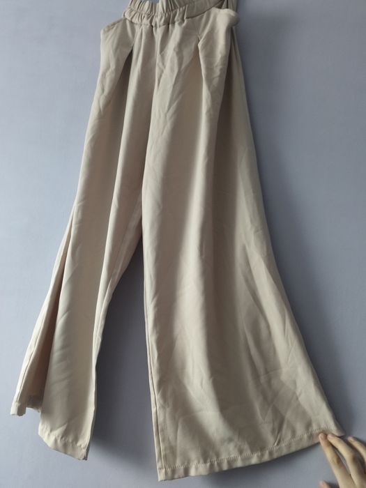 Spodnie młodzieżowe letnie beżowe 158  typu wide leg