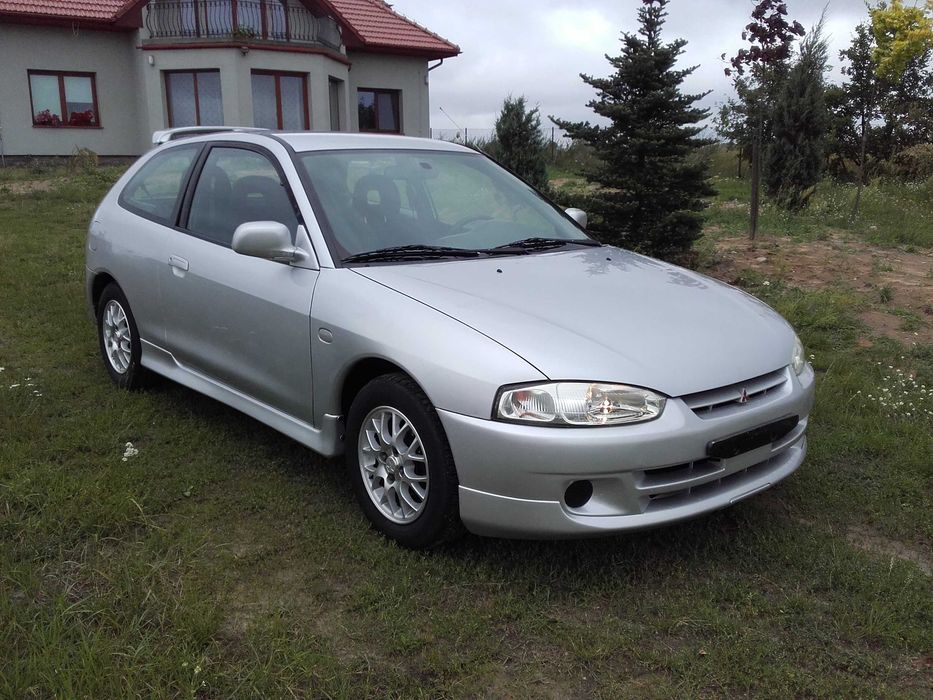 Podnośnik mechanizm szyby lewy kierowcy Mitsubishi Colt cj0 95-03r