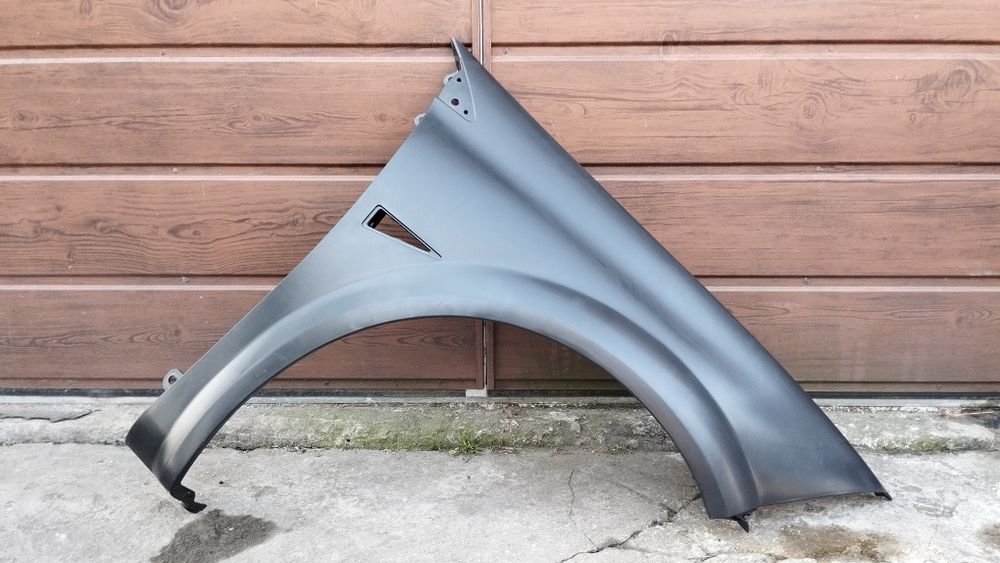 Prawy przedni błotnik Megane 2