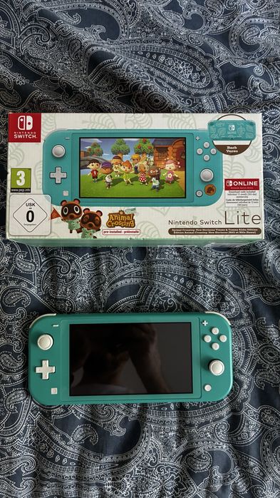 Consola Nintendo Switch lite turquesa com mala