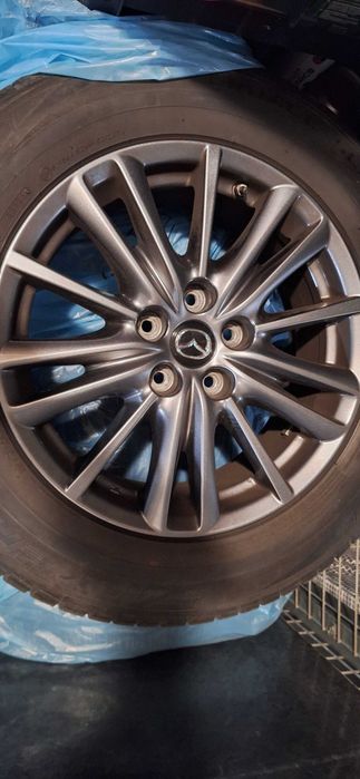 4x Kola Oryginalne Felgi aluminiowe Mazda 9965 A1 7070 r.17, 5x114, opony Falken euro all season