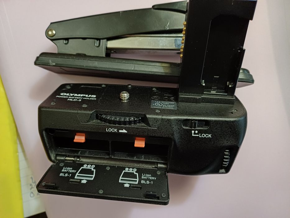 Punho Olympus modelo HLD-5