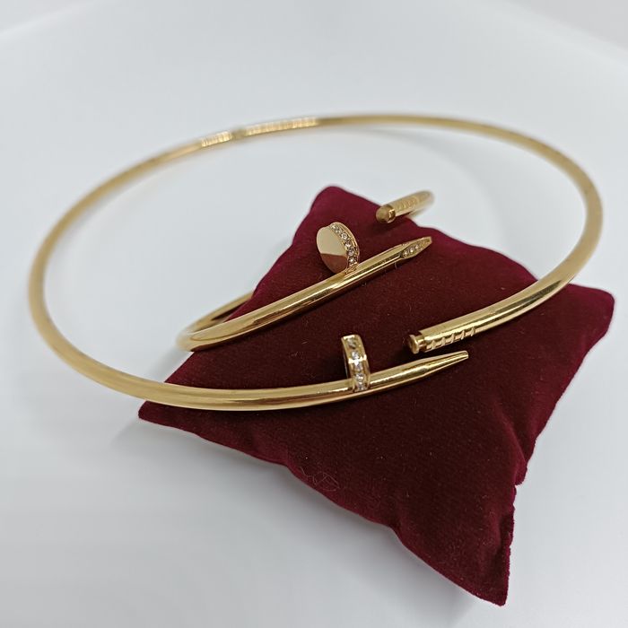 Набір прикрас жіночий: жорсткий чокер і браслет цвях  з цирконіями