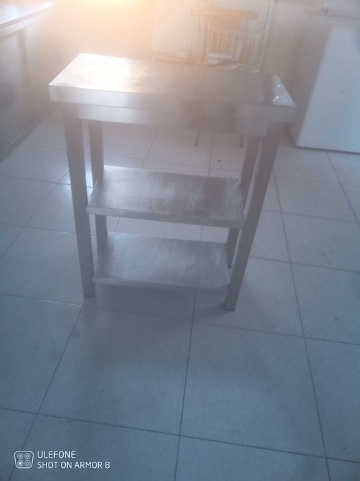 Mobiliario de café em inox