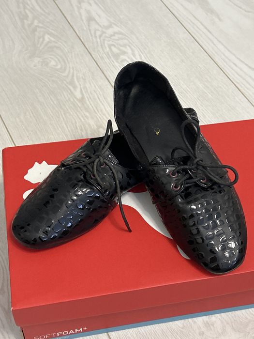 Новые кожаные туфли