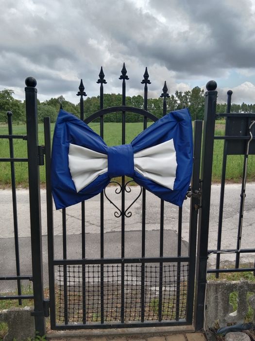 Ozdobna mucha na dekoracje weselną