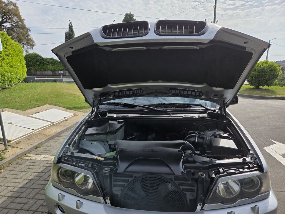 Bmw x5 30I  gasolina troco por carro  2 lugares a gasolina