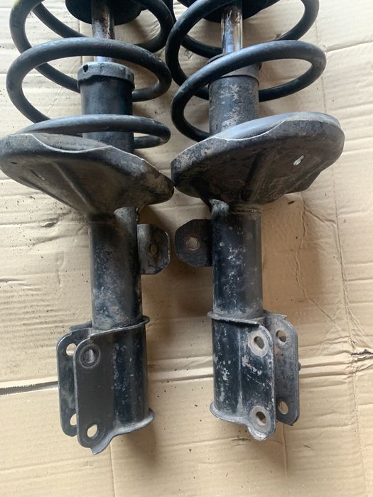 Передние стойки амортизаторы Шевроле Авео заз вида опоры пружины СТО