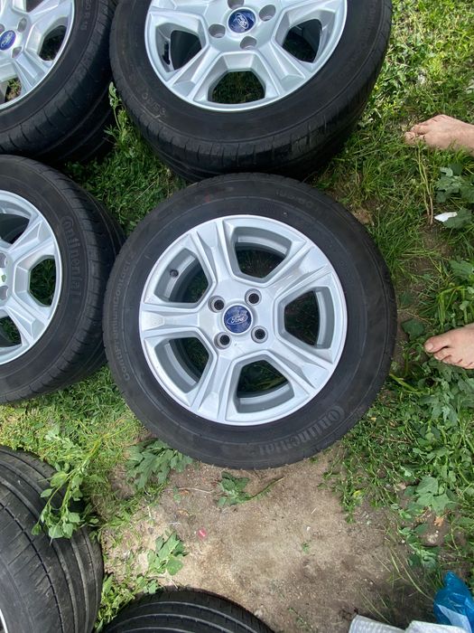 Alufelgi orginalne Ford 15-4x108 z oponami letnimi continental