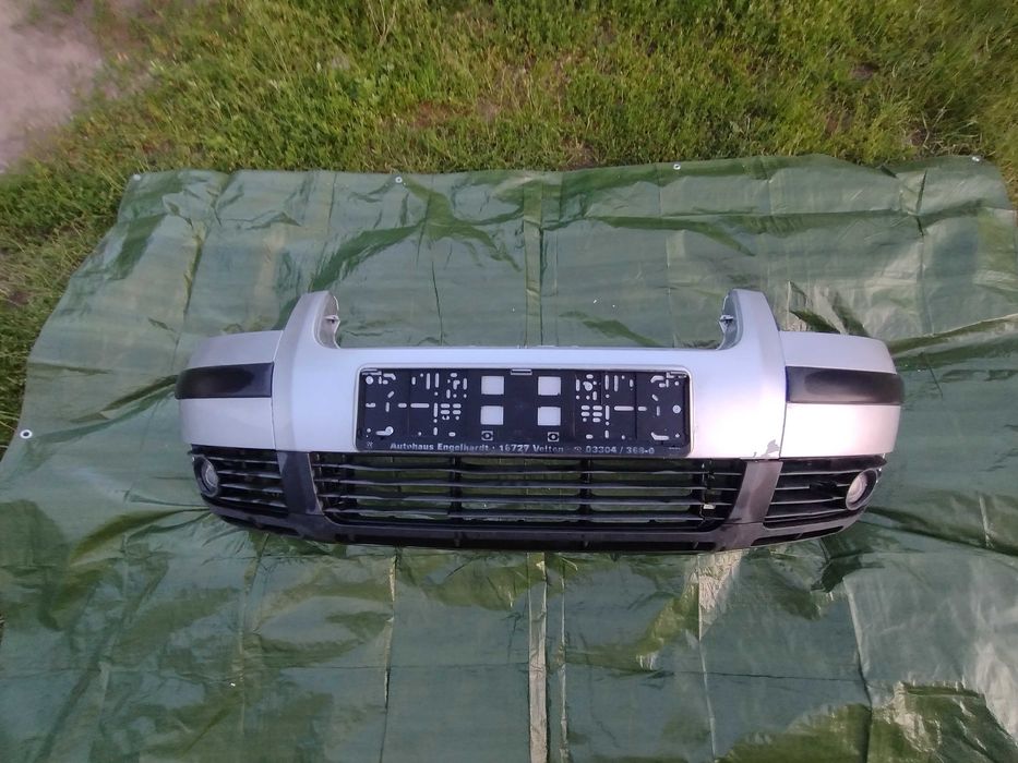 VW Passsat B5 FL zderzak przod srebrny LAW7 04R