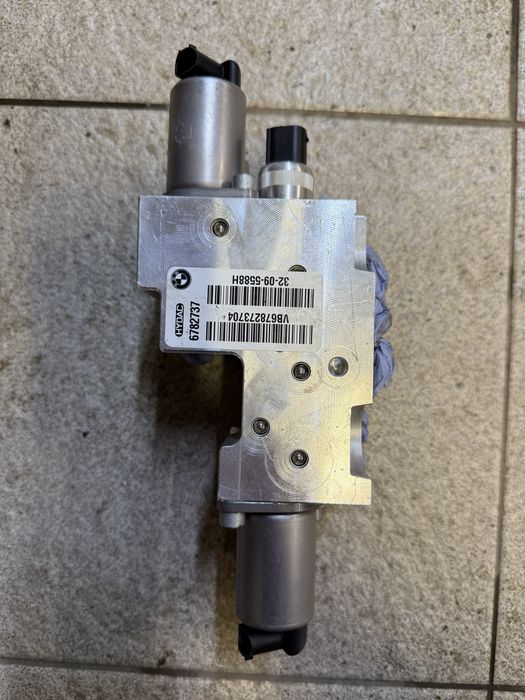 Блок клапанів bmw e70 e71 dynamic drive.