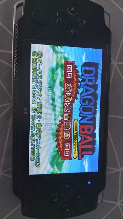 Consola Portátil com muitos muitos jogos (Como Nova)