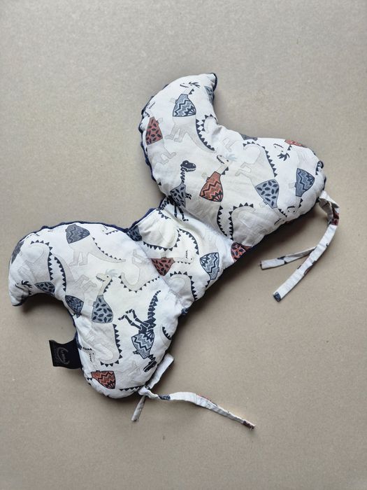 Motylek stabilizujący główkę, poduszka