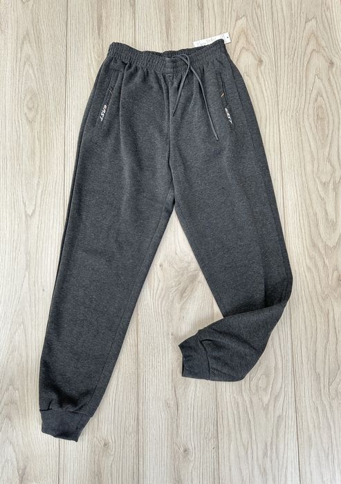 Теплі спортивні штани на манжеті однотонні фліс M L XL 2XL 3XL