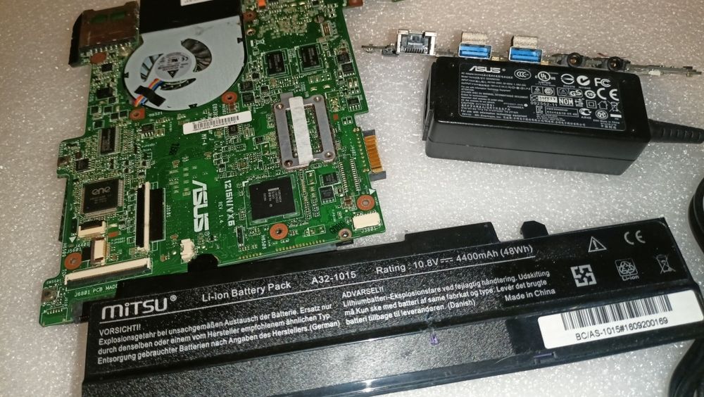 Laptop ASUS - płyta główna, bateria, zasilacz