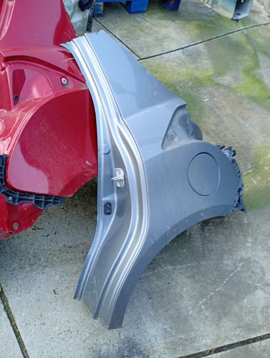 Suzuki Swift MK7 błotnik lewy tył tylny