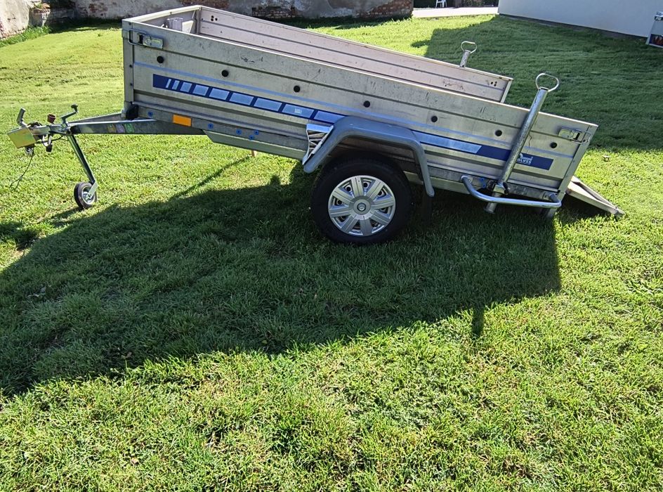Przyczepa lekka Blyss uchylna burta.