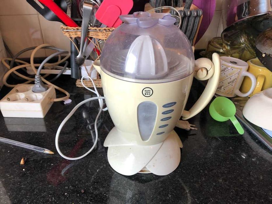 máquina de fazer sumos de laranja