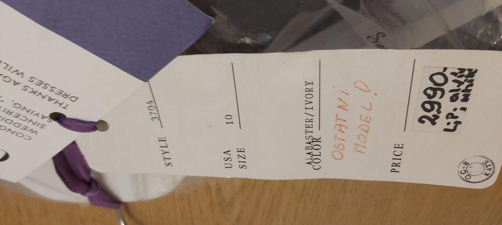 Suknia ślubna z certyfikatem, tren podpinany