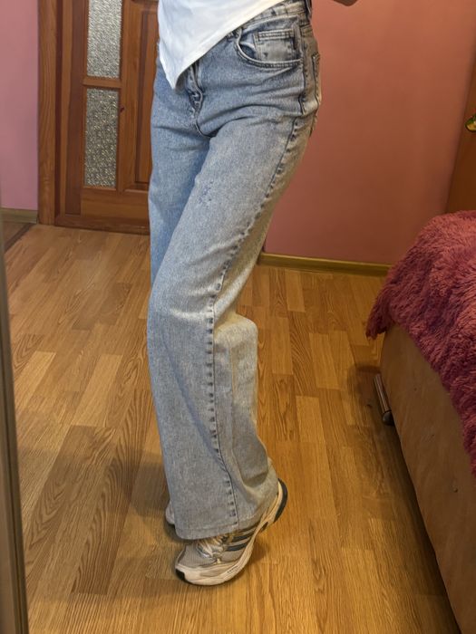 Жіночі джинси кльош