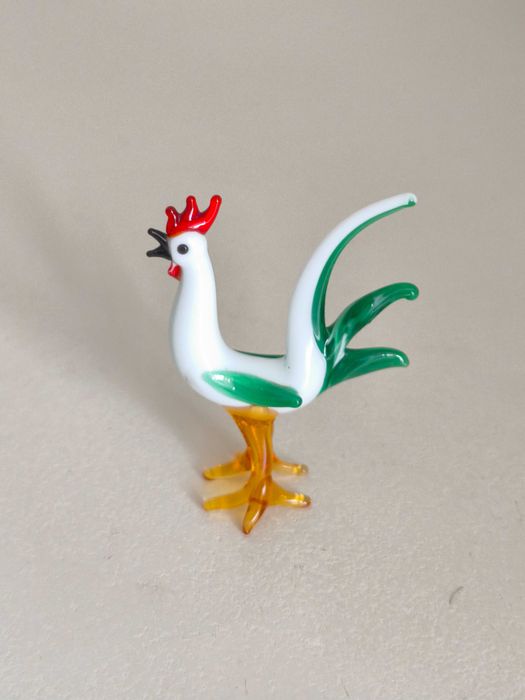Pequeno galo de vidro