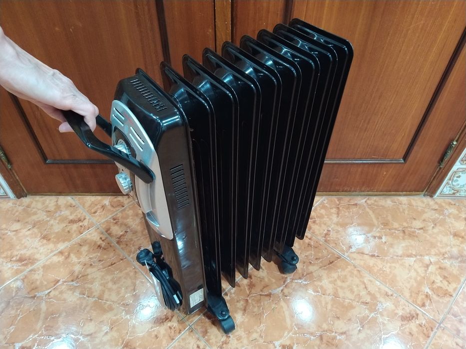 Aquecedor radiador a óleo casa quarto apartamento vivenda escritório gabinete cozinha.