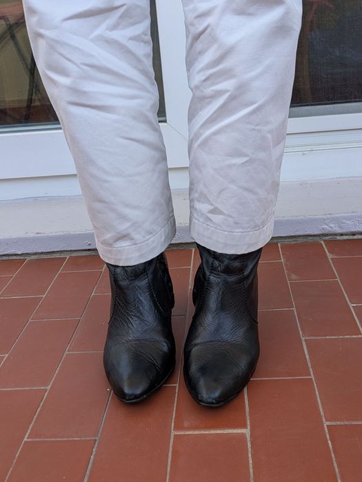 Botas pretas cano alto