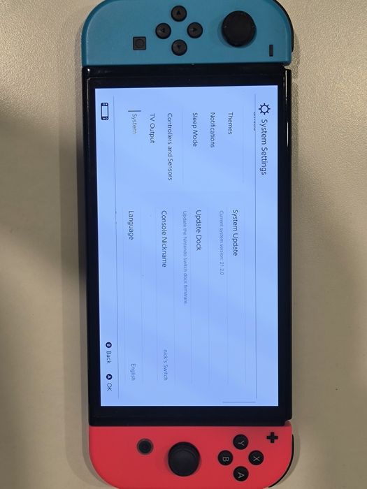 Nintendo Switch OLED with Neon Blue and Neon Red