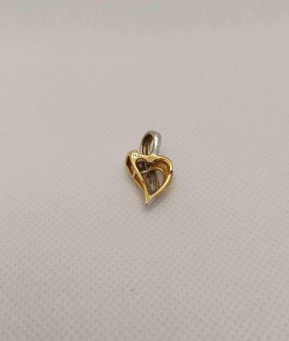 Золотий кулон з Діамантами