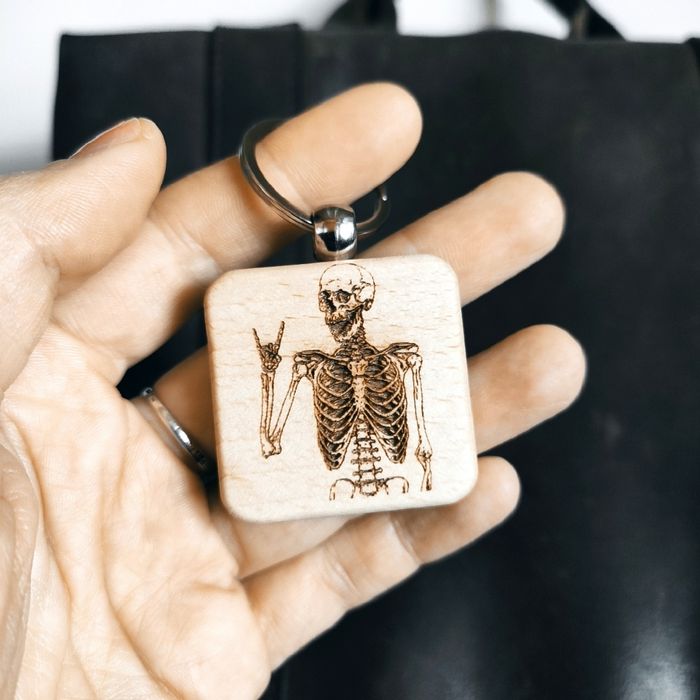 брелок religion бук