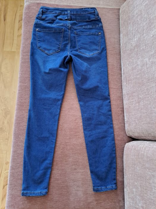 Nowe spodnie damskie jeansy r. 36